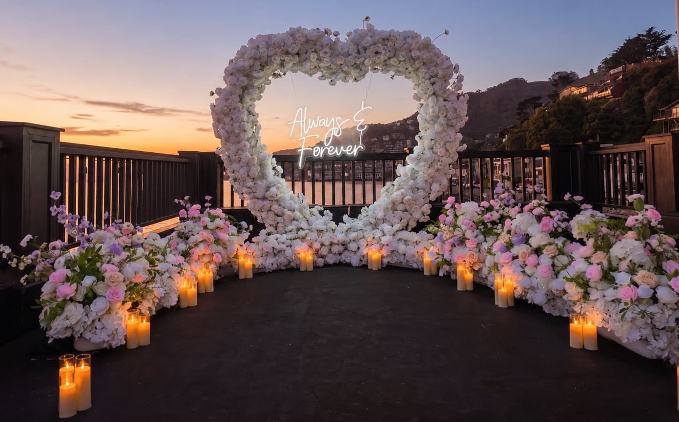 ERIA Sausalito rooftop terrace decorated with white and pink florals and candle walkway