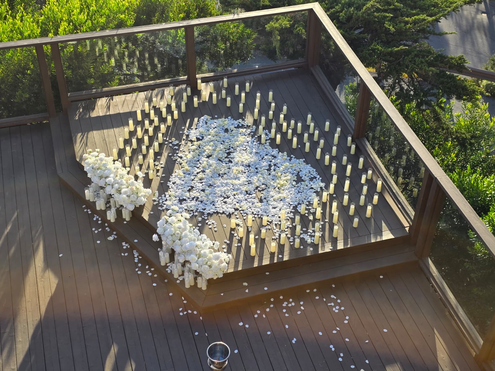 Intimate heart of candles with rose petals proposal setup at Hyatt Carmel Highlands, Carmel California